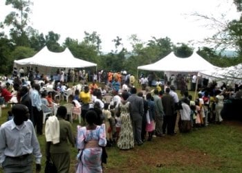 Guests Line Up for a Meal after Graduation